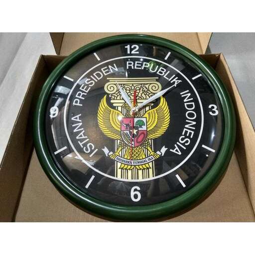 a clock with a picture of a person on it.