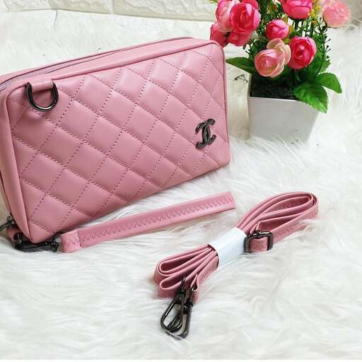 pink leather belt with a zipper