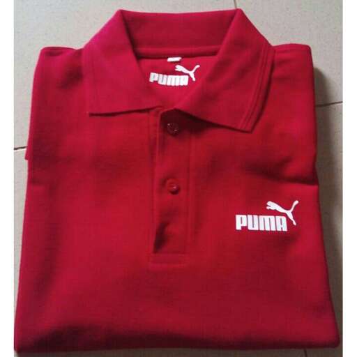the shirt is available in red and white.