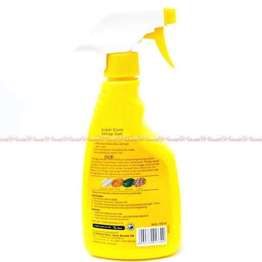 a yellow bottle with a white label