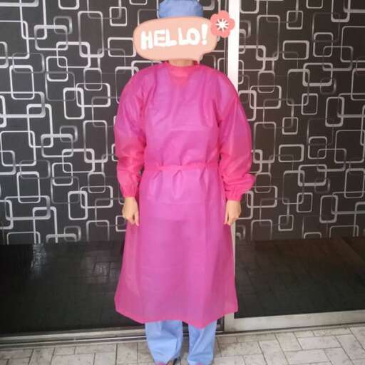 a man in a pink outfit