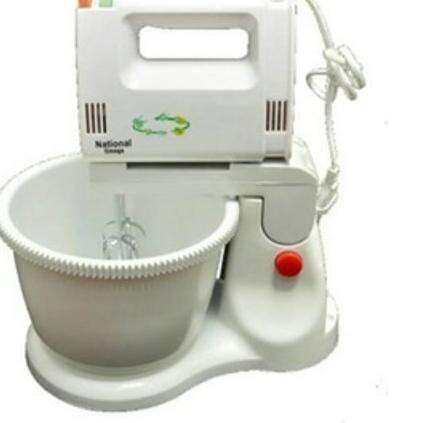 a white sink with a white bowl next to it.