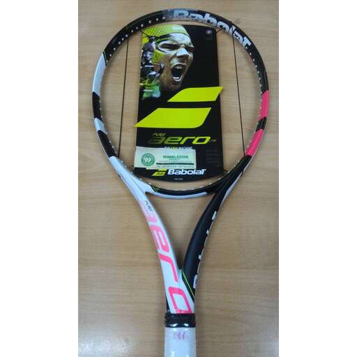 a tennis racket with a picture of a tennis player on it.