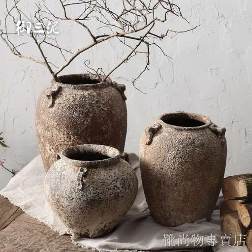 a couple of vases that are sitting on a table