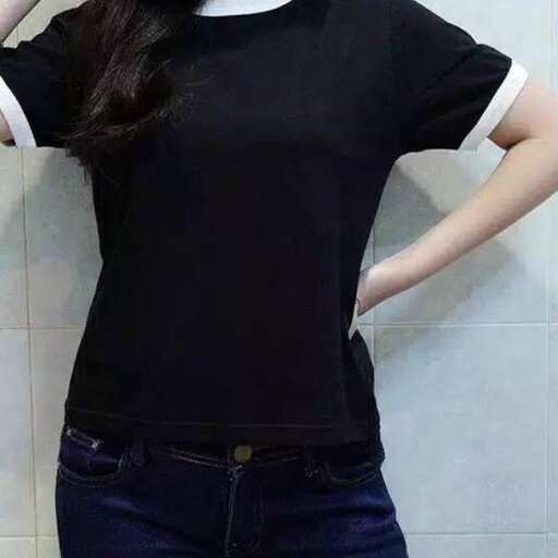 a woman with a white shirt and jeans