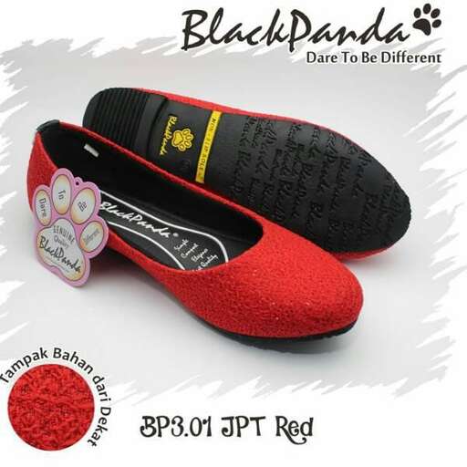 red shoe with black and red flower design.