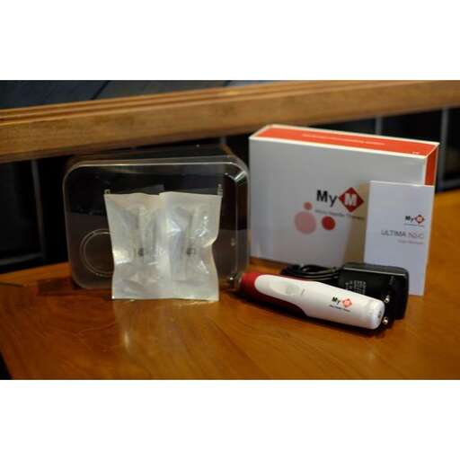 a small box with a phone and a package of cigarettes.