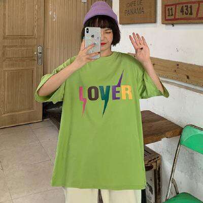 a green shirt with a rainbow logo on it