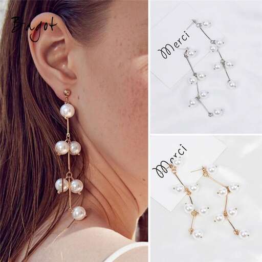 earrings in sterling silver with a pearl necklace