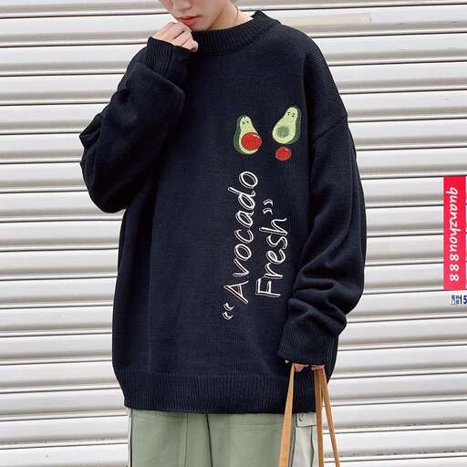 a sweater with a bird on it.