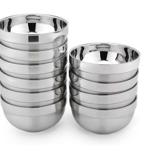 a pair of stainless steel bowls on a white background.