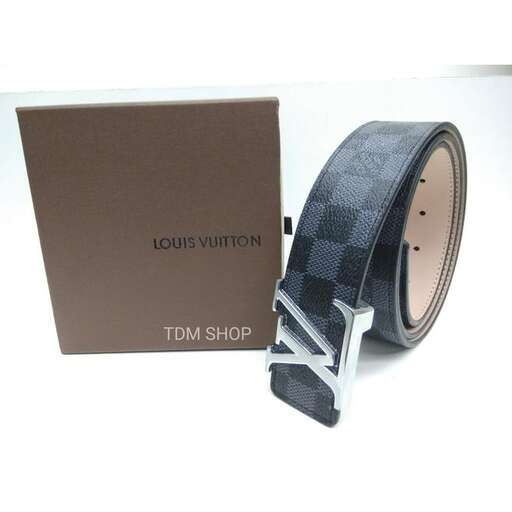 a watch with a leather strap on a white background.