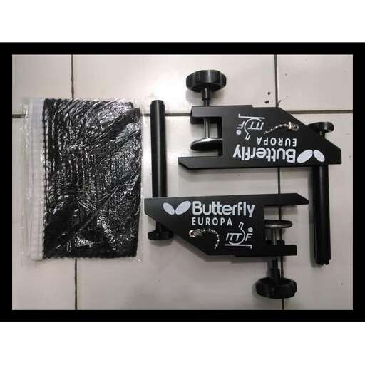 a sign on a wall with a picture of a butterfly.