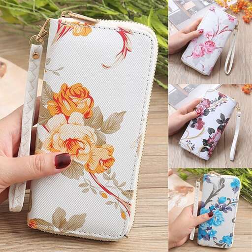 this is a beautiful handbag with a floral design.