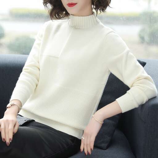 the model wears a white sweater with red lips