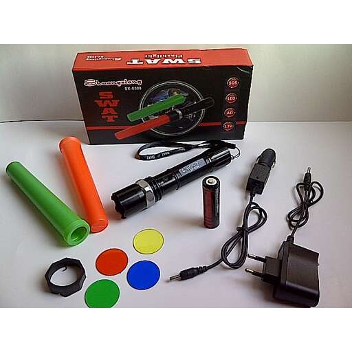 a table topped with a box of batteries and a box of glue.