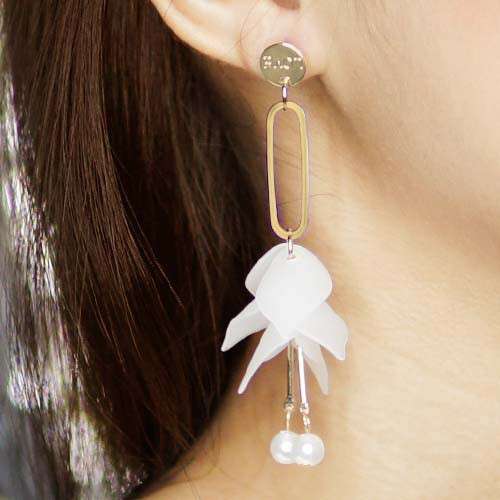white butterfly earrings with white butterfly earrings in the shape of a butterfly