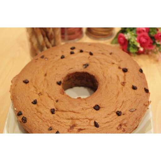 a cake with chocolate chips on it.