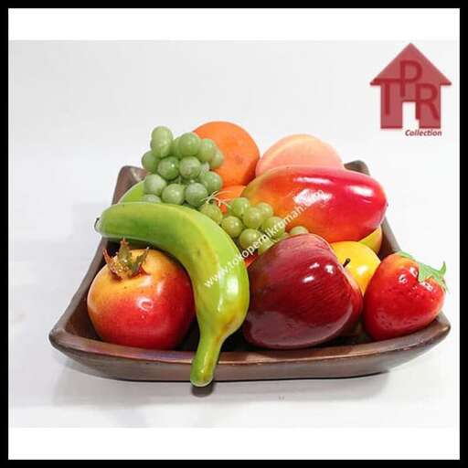 a wooden tray with a variety of fruits.