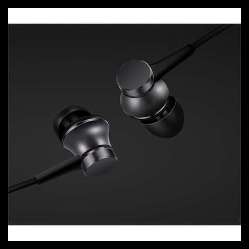 a pair of wireless headphones hanging from a wire.