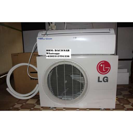 a white electric heater with a white cord.