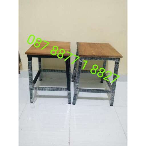 a pair of stools with a table top and legs.