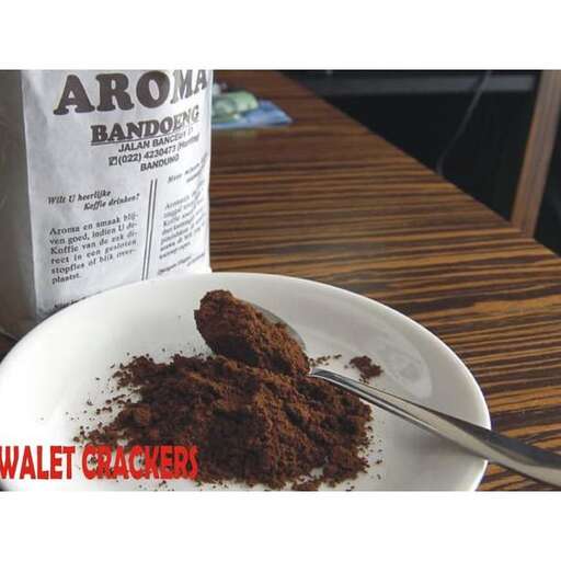 a plate of food with a spoon on it.