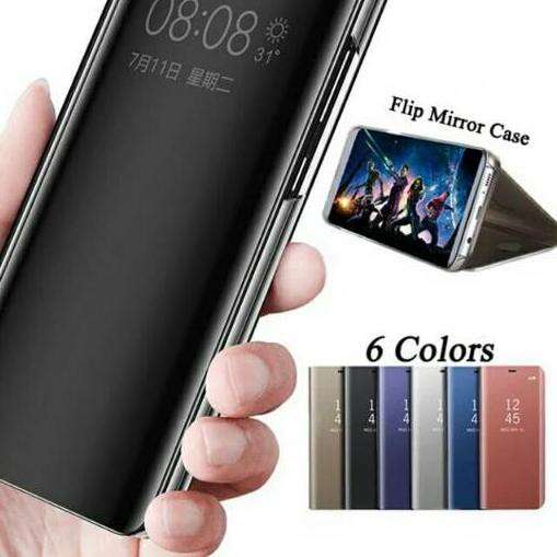 a person holding a phone with a purple color.