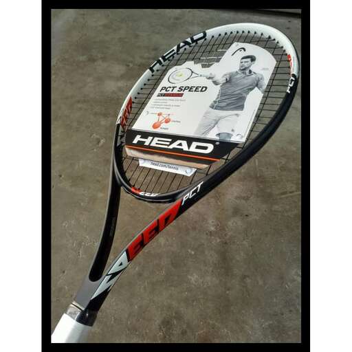 a tennis racket with a picture of a man on it.