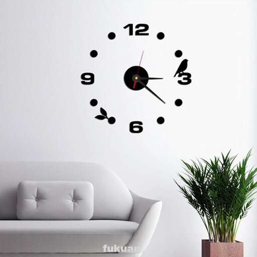 a white wall with a clock on it.