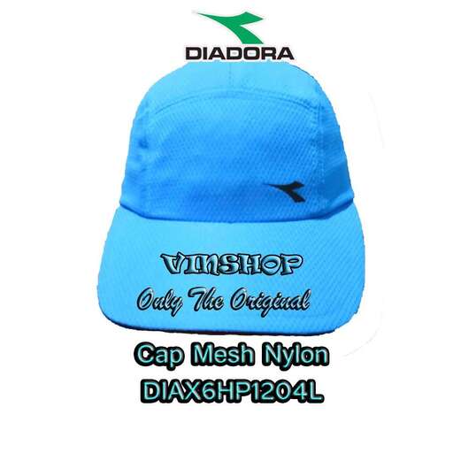 a baseball cap with a bird flying in the sky.