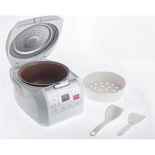 a white mixer and a bowl on a table.