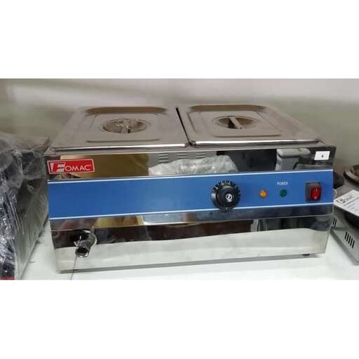 a stove with a blue top and a white stove top.