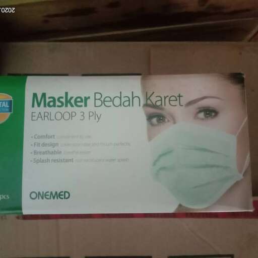 a box that has a mask on it.