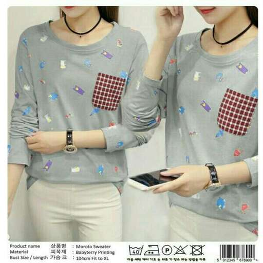 a sweater that is very cute and has a little bit of sewn on it.