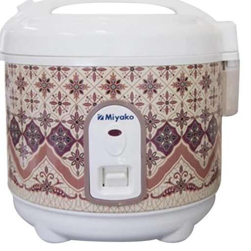 a white crock pot with a lid on top of it.