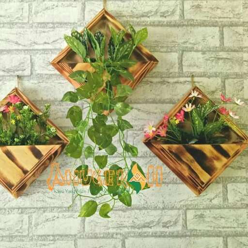 a set of flower pots with plants in them