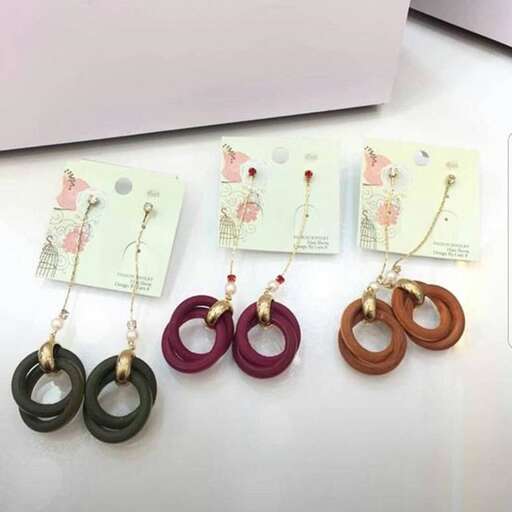 a set of three different colored buttons.