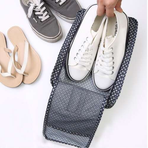 a pair of shoes with a shoe in the bag.