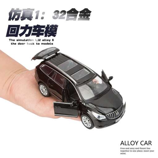 a hand holding a car that is shaped like a car.