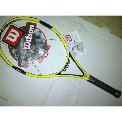 a tennis racket with a logo on it.