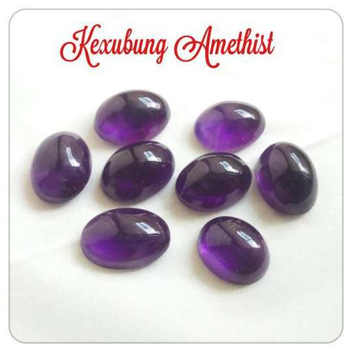 fused glass beads in a glass bowl