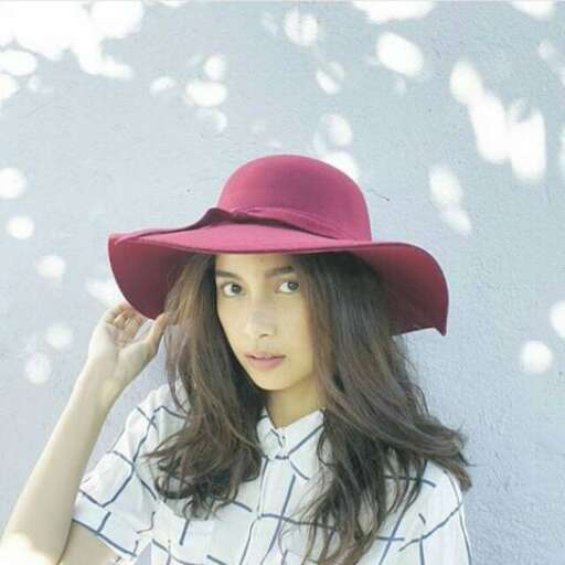 person in a pink hat