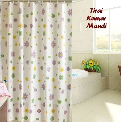 a bathroom with a shower curtain and flowers on it.