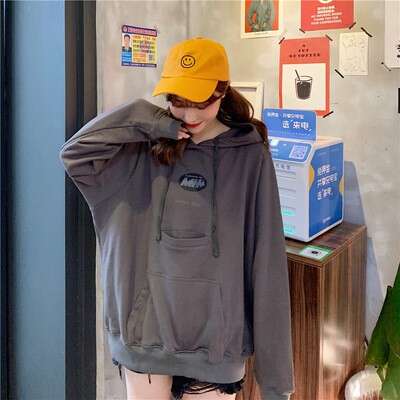 a girl in a yellow hat