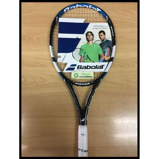 a tennis racket with a picture of a man and a woman.