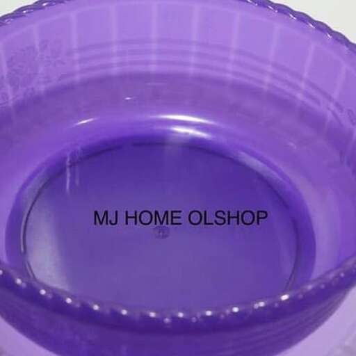 purple glass bowl with a purple liquid inside.