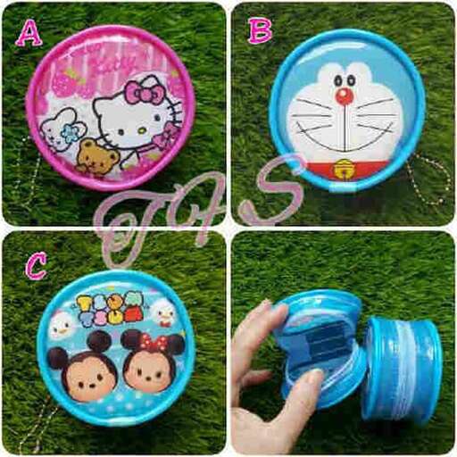 a child's play set with two frisbees and a cat toy.
