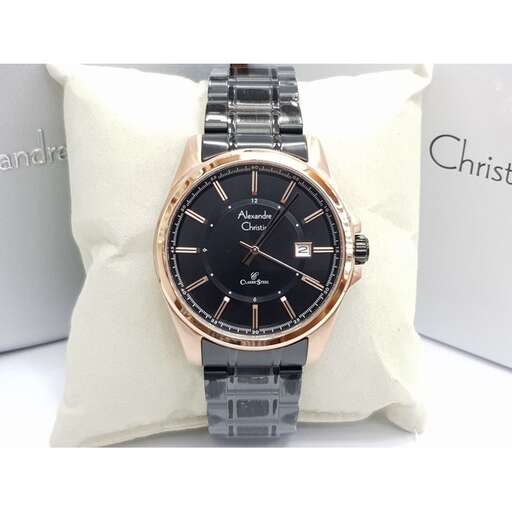 a watch with a black face and gold band.