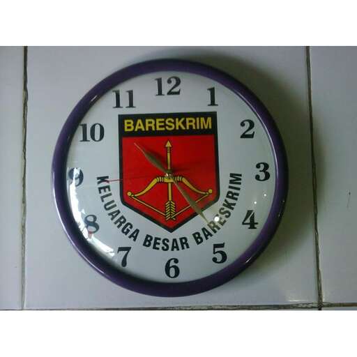 a clock in the wall of a building in prague.